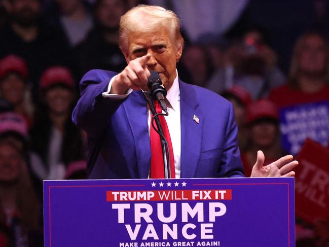 NEW YORK, NEW YORK - OCTOBER 27: Republican presidential nominee, former U.S. President Donald Trump speaks at a campaign rally at Madison Square Garden on October 27, 2024 in New York City. Trump closed out his weekend of campaigning in New York City with a guest list of speakers that includes his running mate Republican Vice Presidential nominee, U.S. Sen. J.D. Vance (R-OH), Tesla CEO Elon Musk, UFC CEO Dana White, and House Speaker Mike Johnson, among others, nine days before Election Day.   Michael M. Santiago/Getty Images/AFP (Photo by Michael M. Santiago / GETTY IMAGES NORTH AMERICA / Getty Images via AFP)