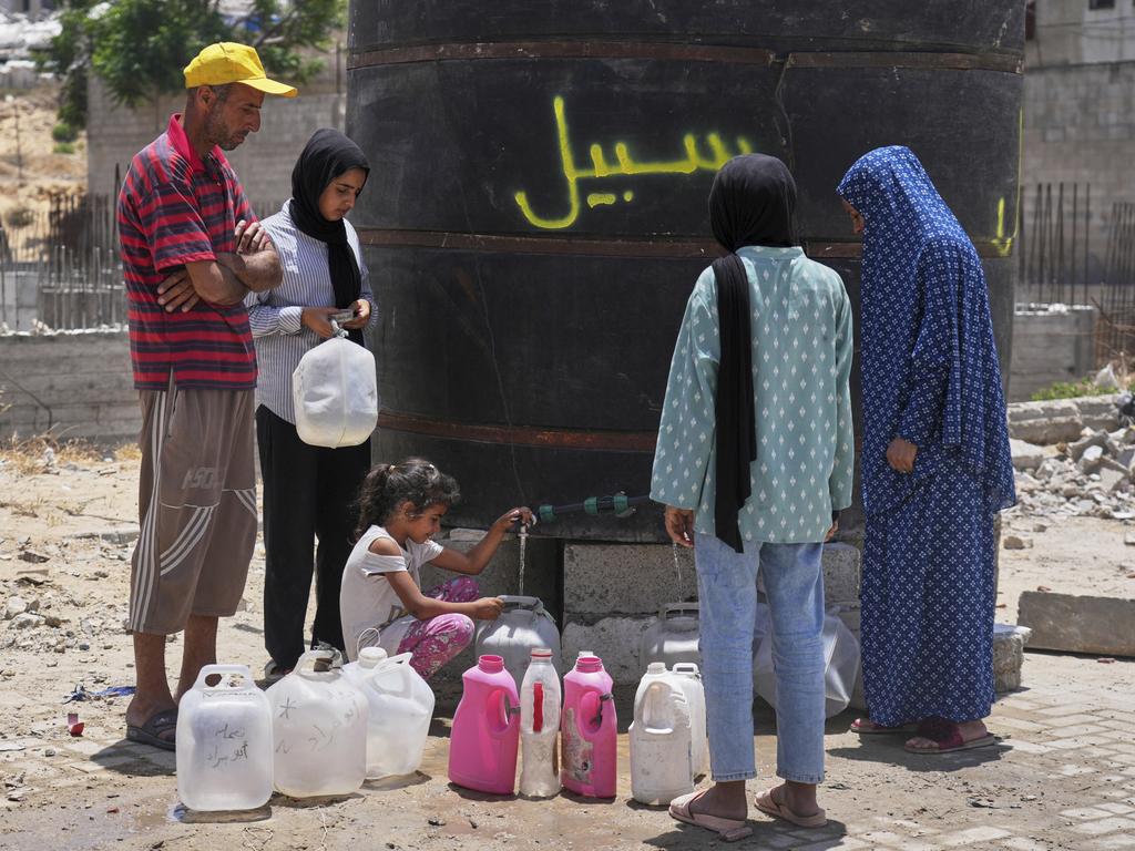 Members of the Abu Jarad family, who were displaced in Gaza City. Picture: AP Photo/Jehad Alshrafi