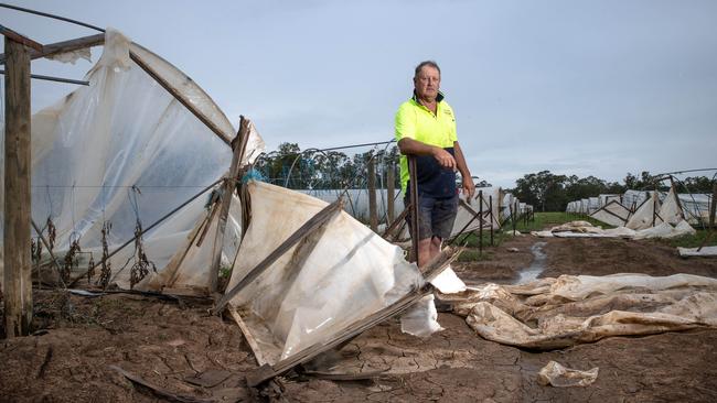 Despite his best efforts to save his sheds, Mr Martin said “about seven feet of water went through them.” Picture: Jason Edwards