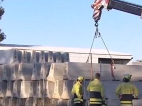 A teenager has suffered a serious leg injury after a concrete slab fell 3m at workplace in Edinburgh North. Picture 7NEWS