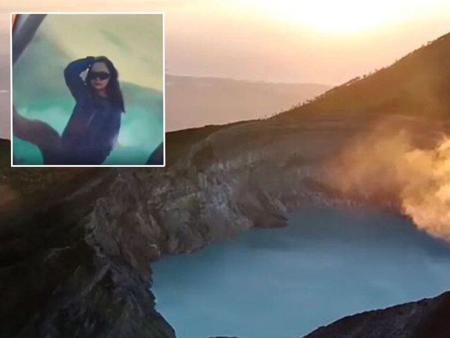 A tourist plunged 76 metres to her death in Indonesia after tripping while taking photos.