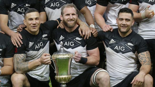 New Zealand’s Sonny Bill Williams, Kieran Read and Codie Taylor pose with the Gallaher Trophy.