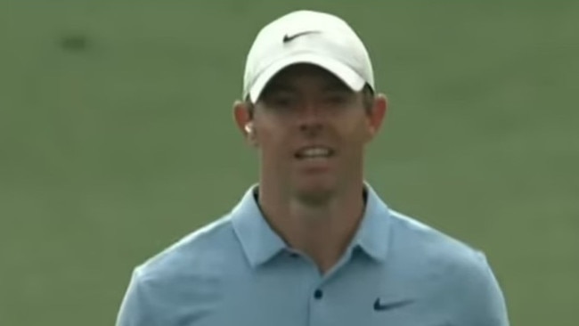 Rory McIlroy with one Airpod in.