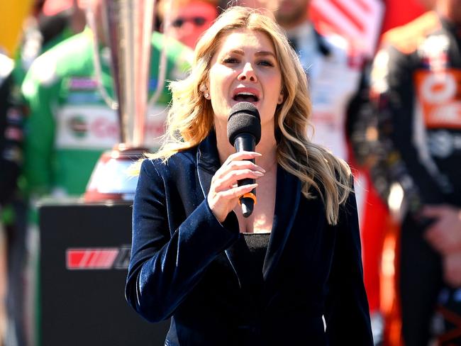 BATHURST, AUSTRALIA - OCTOBER 08: Natalie Bassingthwaighte sings the national anthem ahead of the Bathurst 1000, part of the 2023 Supercars Championship Series at Mount Panorama on October 08, 2023 in Bathurst, Australia. (Photo by Morgan Hancock/Getty Images)