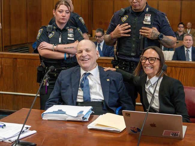 The disgraced movie mogul shares a laugh with his lawyer, Jennifer Bonjean. Picture: AFP