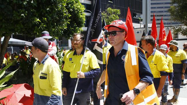 Union members speaking outside 1 William Street in the Brisbane CBD on Wednesday. Picture: NCA NewsWire/Tertius Pickard