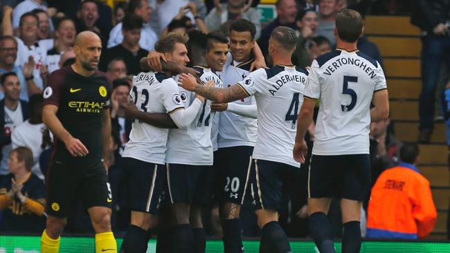 Tottenham's players celebrate taking the lead.