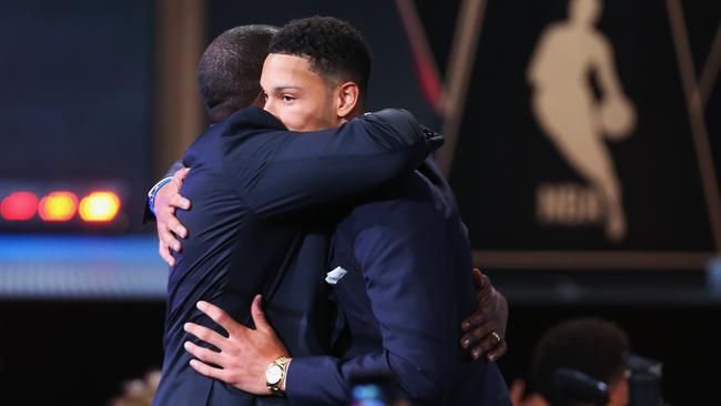 Simmons gets a hug from father Dave — who played in Australia with the Melbourne Tigers and was coached by Brett Brown, the man who will now coach his son in his first season at the 76ers. Picture: Getty Images