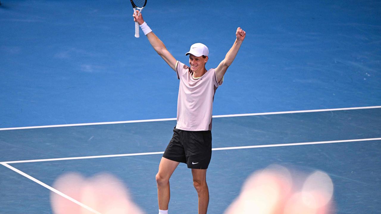 Italy's Jannik Sinner celebrates victory against Serbia's Novak Djokovic during their men's singles semi-final match. Picture: William West / AFP.