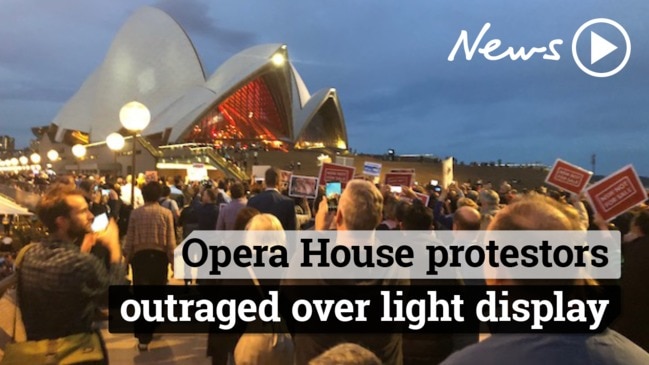 Angry protestors gather at Opera House