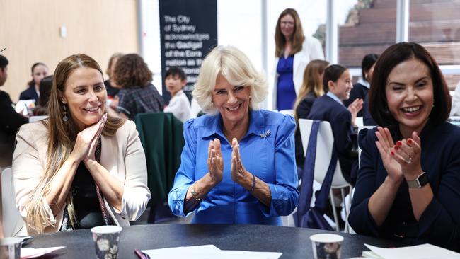 Queen Camilla (C) claps alongside author Kylie Captain (L) and New South Wales’ Deputy Premier Prudence Car during a visit to the Green Square Library on October 22, 2024 in Sydney, Australia. Picture: David Gray-Pool/Getty Images