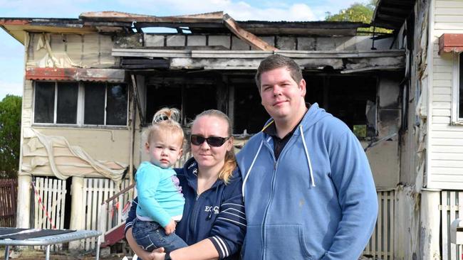 DESTROYED: Codey and Daniel Bromilow, with their young daughter Rebekah, lost their home last to a fire that police are treating as suspicious. Picture: Maddelin McCosker