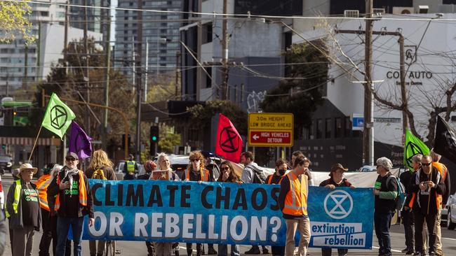 Police confirmed two men were arrested following chaotic scenes on the streets of Melbourne as two protest groups - one of them Extinction Rebellion - held planned demonstrations. Picture: NewsWire/Tamati Smith.