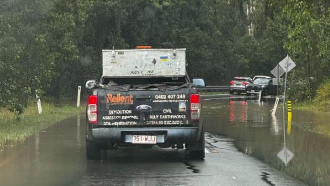 A flooded road in Springfield Lakes. Picture: Mina Barriball