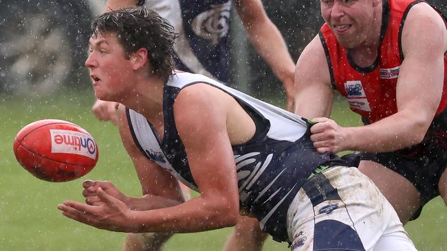 Evan Donoghue in action for Melton Centrals. Picture: Hamish Blair