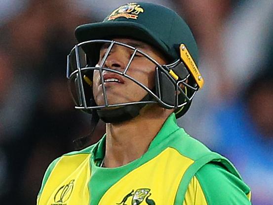 MANCHESTER, ENGLAND - JULY 06: Usman Khawaja of Australia reacts after playing the ball on to his own wicket to be dismissed during the Group Stage match of the ICC Cricket World Cup 2019 between Australia and South Africa at Old Trafford on July 06, 2019 in Manchester, England. (Photo by Alex Livesey/Getty Images)