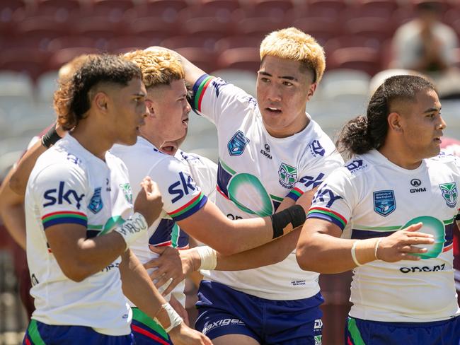 Bishop Neal celebrates a try. Picture: Julian Andrews