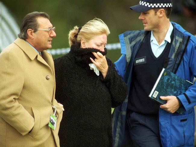Mark Moran’s mother Judy arrives at the scene of her son's murder with father Joe Giaccobe.