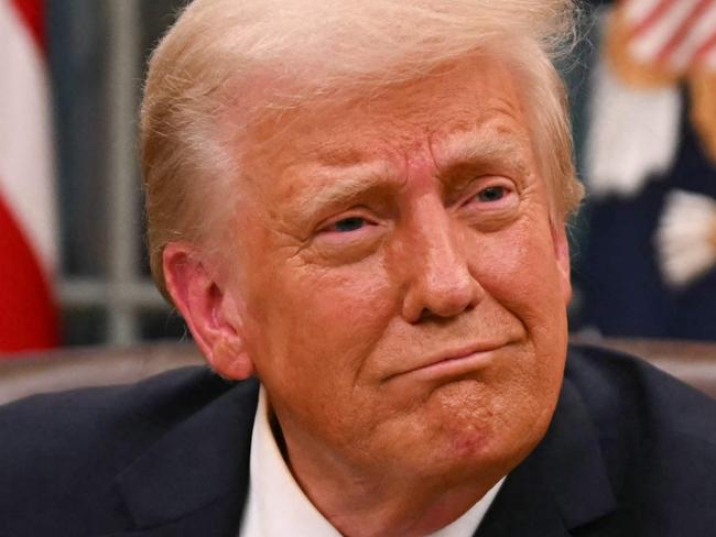 US President Donald Trump signs executive orders in the Oval Office of the White House in Washington, DC, on January 20, 2025. Picture: NewsWire / Jim WATSON / POOL / AFP