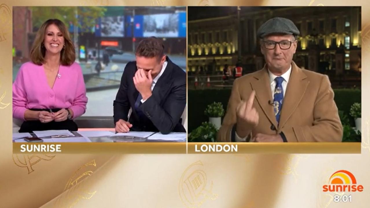 Sunrise host David Koch (right) flipped his co-hosts Natalie Barr and Matt Shirvington the bird after a comment over his flat cap.