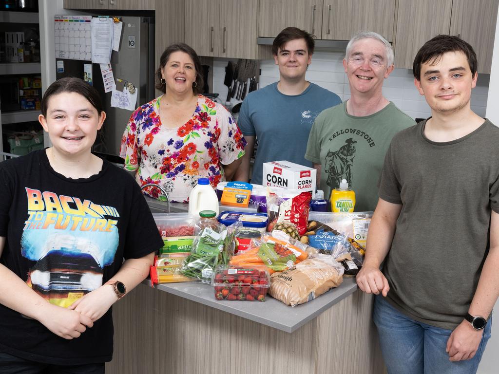 The Priestley family, Denia and Mark with their children Emily, 17, Peter 20, and Ben, 15 with their weekly shopping. Picture: Brendan Read