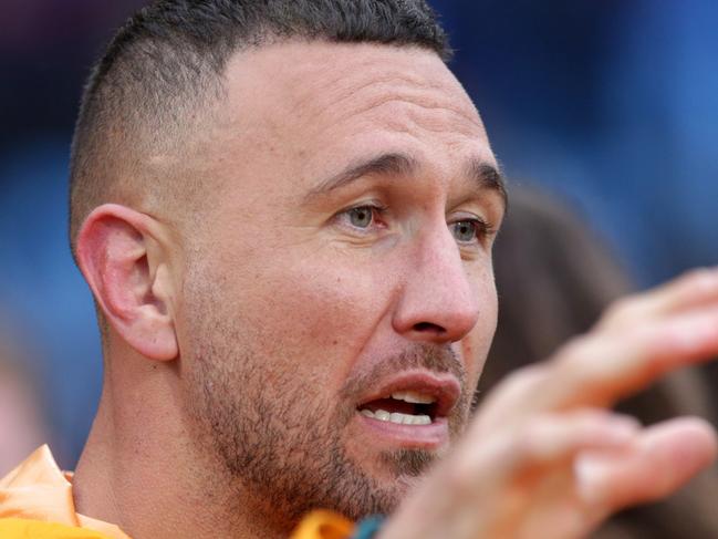 MENDOZA, ARGENTINA - AUGUST 06: Quade Cooper of Australia talks to a teammate from the sidelines after suffering an injury during The Rugby Championship match between Argentina Pumas and Australian Wallabies  at Estadio Malvinas Argentinas on August 06, 2022 in Mendoza, Argentina. (Photo by Daniel Jayo/Getty Images)