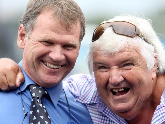 Gold Coast Races. Winner race 5, number 2 Mishani Honcho, Jockey Chris Whiteley, trainer Les Rossm (left) with Manager Mike Crooks.  Pic Jono Searle.