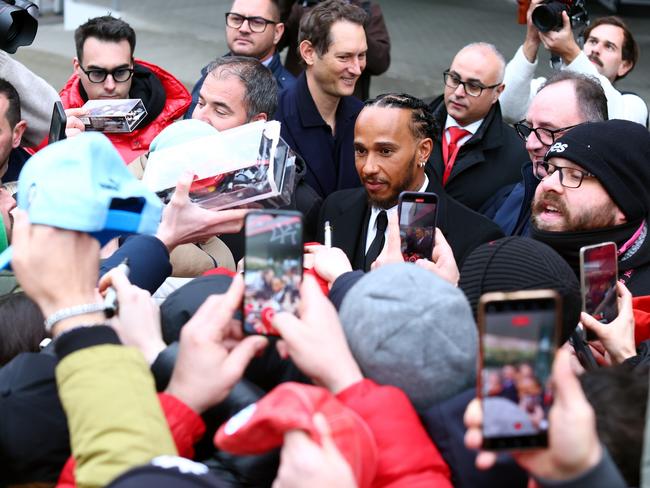 Sir Lewis Hamilton greets fans during his first official days as a Scuderia Ferrari F1 driver. Picture: Clive Rose/Getty Images