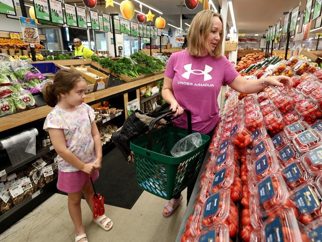 Louise Young and her daughter Isla at Harris Farm store at Clayfield Picture David Clark