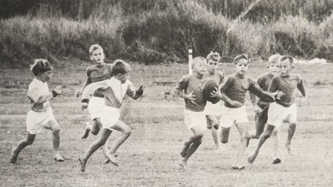 A young Wally Lewis was captured spearing the ball through the line and running away with the ball in an Under 9s rugby league clash in 1968.