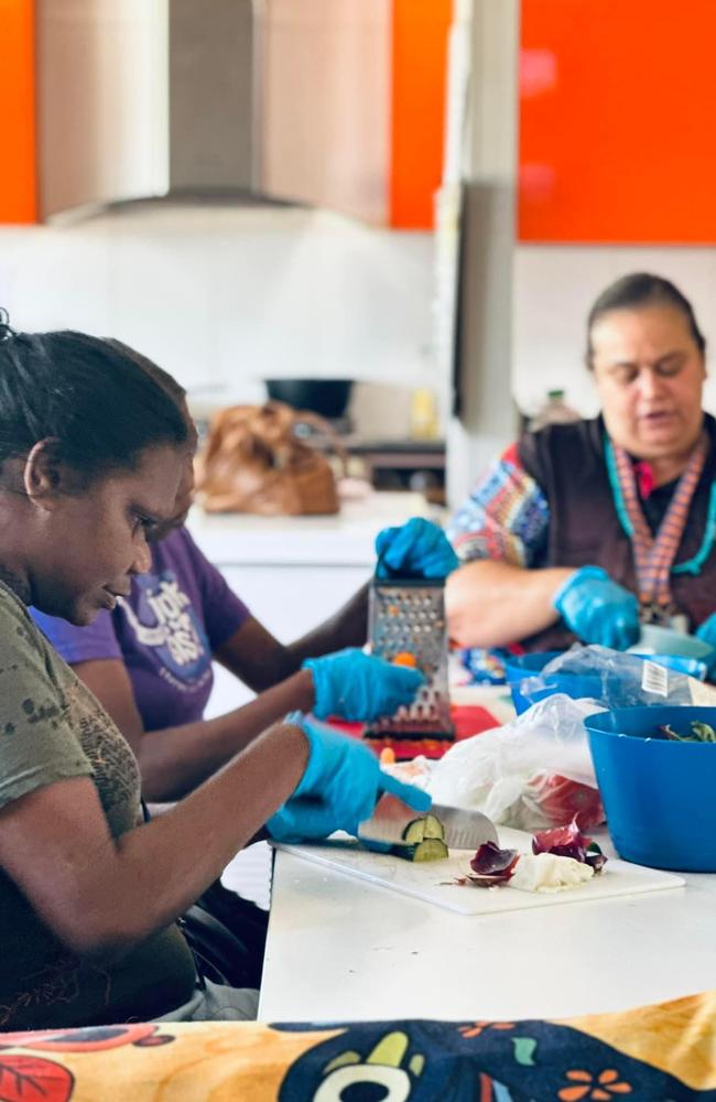 Women work with their case worker to build life skills. Picture: Supplied, Leeanne Caton