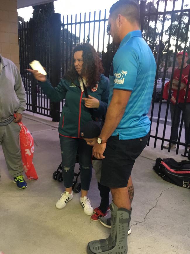 Jarryd Hayne in a moon boot after Saturday’s game between the Dragons and the Gold Coast Titans.