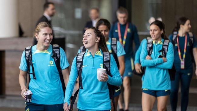 Matildas players Clare Hunt and Clare Wheeler leaving the Hilton Hotel in Brisbane.