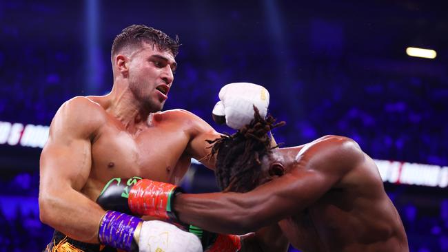 MANCHESTER, ENGLAND - OCTOBER 14: Tommy Fury punches  KSI (Olajide Olayinka Williams) during the Misfits Cruiserweight fight between KSI (Olajide Olayinka Williams) and Tommy Fury at AO Arena on October 14, 2023 in Manchester, England. (Photo by Matt McNulty/Getty Images)