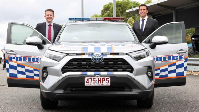 Deputy Premier Jarrod Bleijie (left) and Police Minister Dan Purdie with one of the Queensland Police Service’s new hybrid SUVs. Picture: Liam Kidston