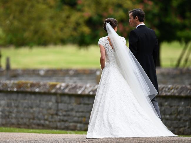 Pippa and her new husband James leave St Mark's Church.