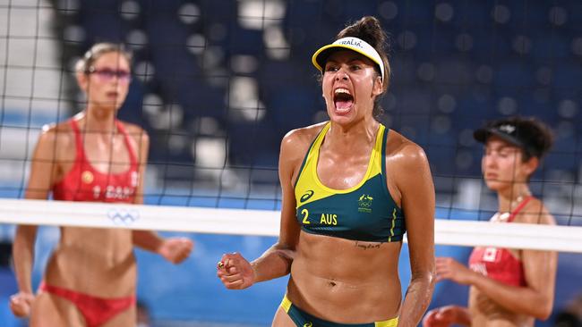 The agony and the ecstasy as the Aussie knock off the world No.1. Picture: AFP