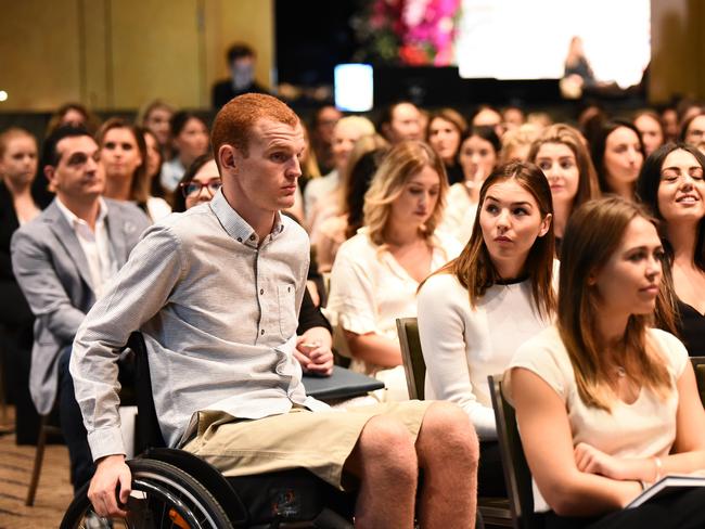 Alex McKinnon and fiancee Teigan Power at the seminar.