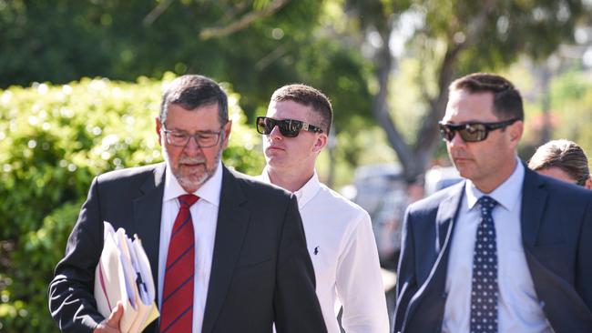 Jacob Fuller (centre) walking with his lawyer (front). Picture: Flavio Brancaleone