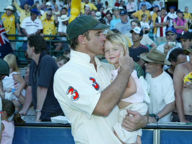Matthew Hayden and daughter Grace during his playing days.