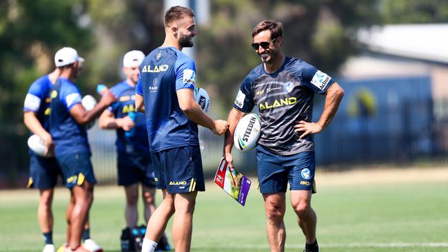 Andrew Johns working with Jaemon Salmon and the Eels’ halves.