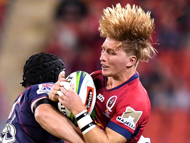 Queensland’s Tate McDermott is tackled.