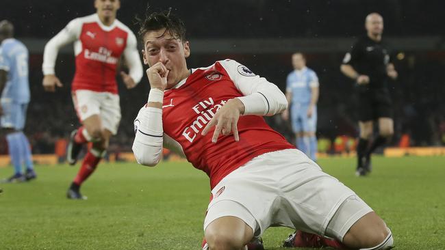 Arsenal's Mesut Ozil celebrates after scoring.