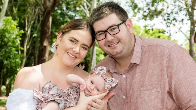 Mum Madeline Mills and Dad Colin Hoyle with baby Grace. Picture: Michaela Harlow