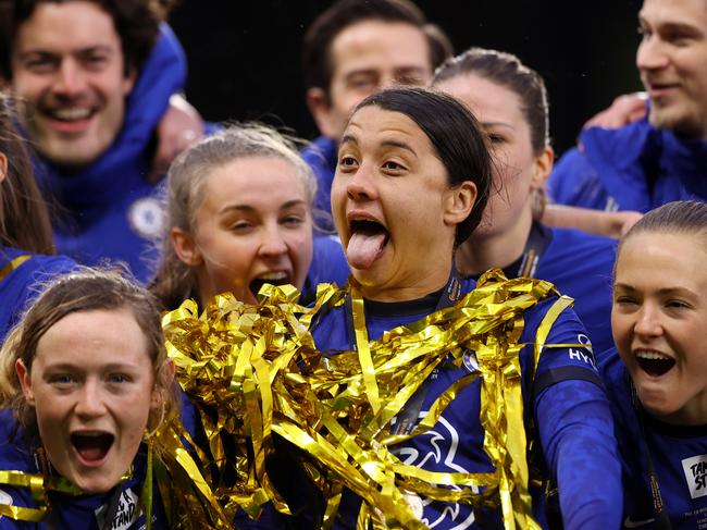 WATFORD, ENGLAND - MARCH 14: Sam Kerr of Chelsea celebrates during the trophy presentation after her teams victory in the FA Women's Continental Tyres League Cup Final match between Bristol City Women and Chelsea Women at Vicarage Road on March 14, 2021 in Watford, England. Sporting stadiums around the UK remain under strict restrictions due to the Coronavirus Pandemic as Government social distancing laws prohibit fans inside venues resulting in games being played behind closed doors. (Photo by Naomi Baker/Getty Images)