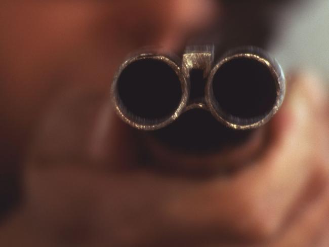 Generic image of barrels of a sawn-off shotgun pointing at camera.