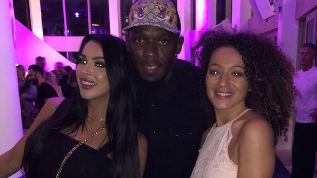 Raquel Petit and Usain Bolt with another club-goer on a night out at a Gold Coast hotspot. Photo: Supplied