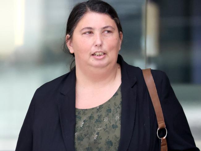 Laura Jean Richards (left), leaves the Brisbane District Court after pleading guilty to stealing thousands in stock and cash from the Chermside Lego store where she worked as a store manager, Brisbane City - on Wednesday 11th October 2023 - Photo Steve Pohlner