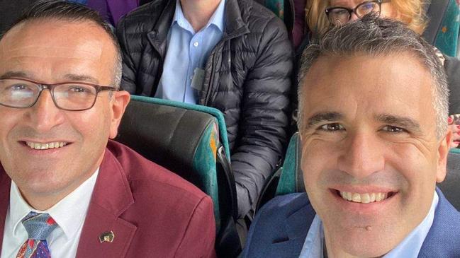 Labor MP Tony Piccolo and Opposition Leader Peter Malinauskas pictured on a charter bus without a mask. Picture: Twitter