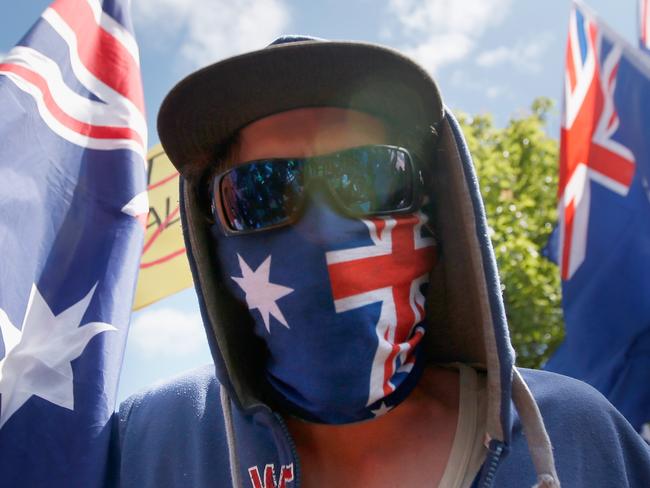 MELBOURNE, AUSTRALIA - NOVEMBER 22: A masked protester is seen during a Reclaim Australia rally held in Melton on November 22, 2015 in Melbourne, Australia. Protestors gathered near the Melton Community Hall to voice their opinions on Australia's laws and cultures. (Photo by Darrian Traynor/Getty Images)